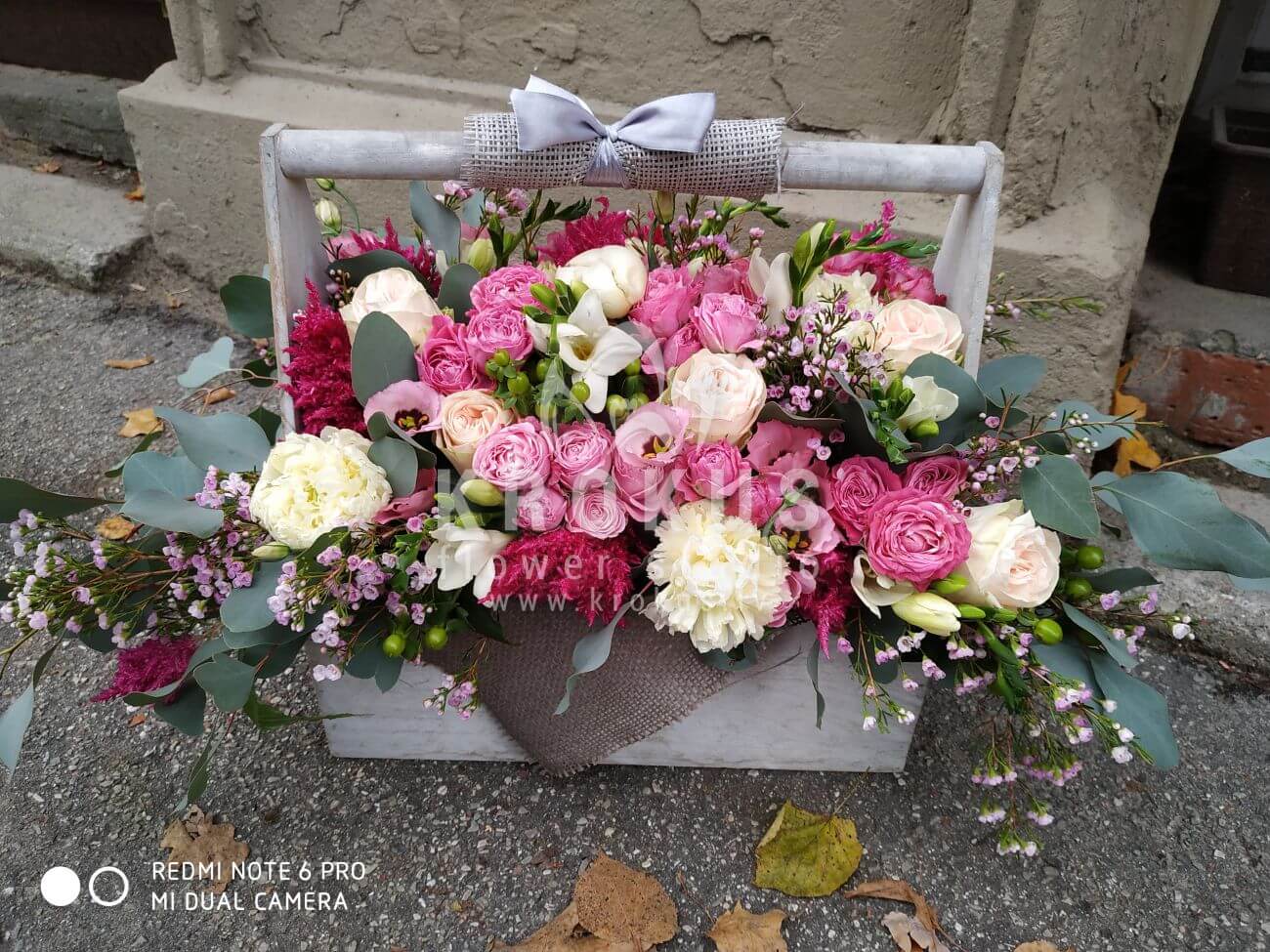 Deliver flowers to Ventspils (boxpink rosesfreesiaalstroemeriawaxflowergum treehypericumpeonies)