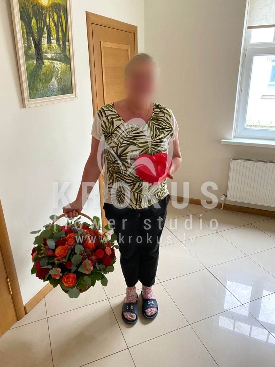 Deliver flowers to Rīga (freesialeucadendroncream rosesgum treeorange rosesred roses)